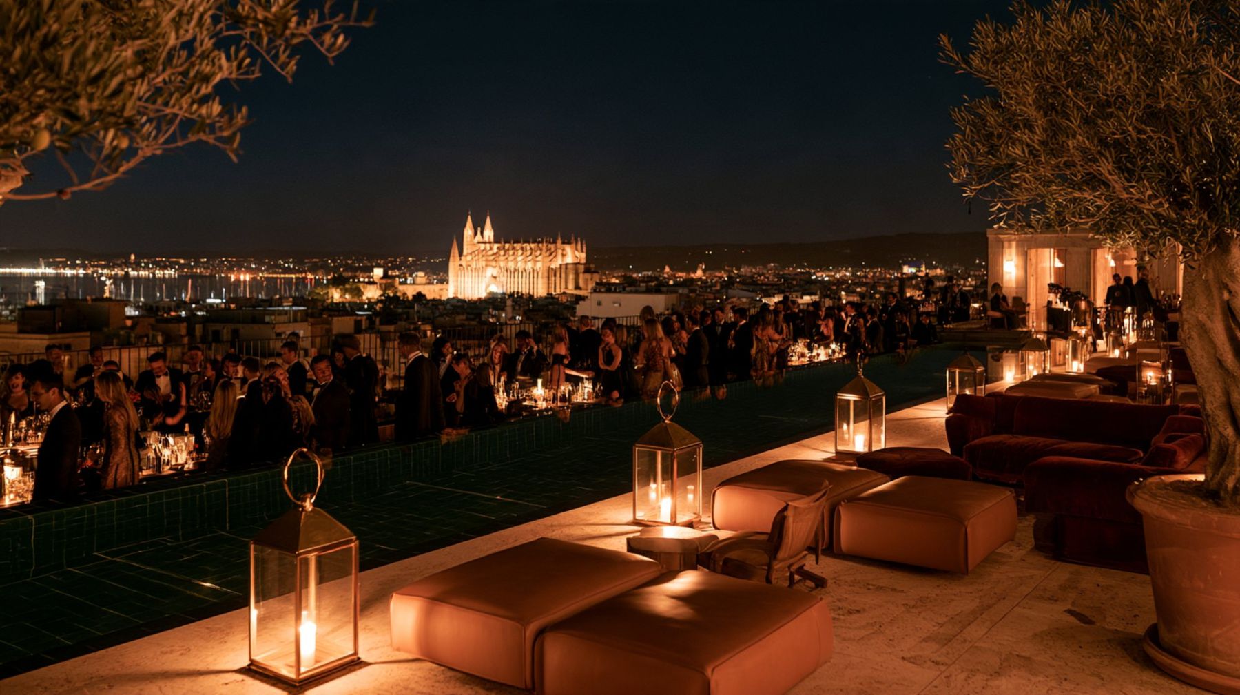 Rooftop terrace of a club hotel above the Bay of Palma at night